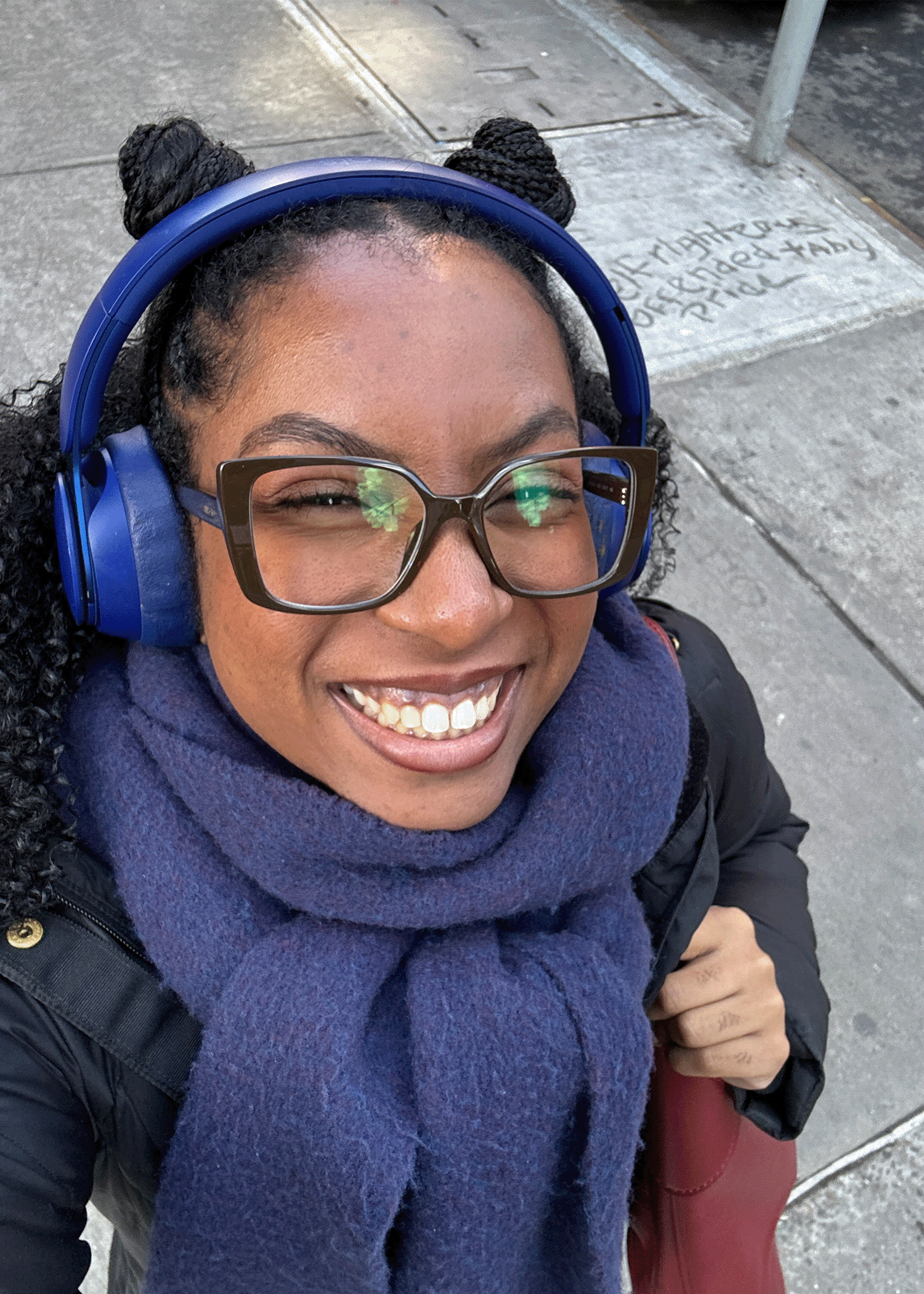 A photo of Kayley grinning ear to ear